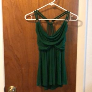 Sexy strappy green top with fun ring detail.
